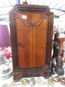 A mid 20th century bedside cabinet.