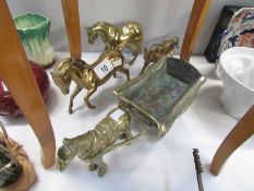 3 brass horses together with a brass horse and dray.