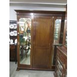 A Victorian mahogany triple wardrobe,