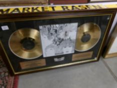 A framed and glazed authentic Beatles memorabilia collection (has custom cardboard box).