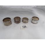 4 silver napkin rings.