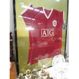 A framed and glazed signed Manchester United shirt, 2006/2007 season.