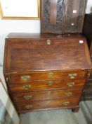 A mahogany bureau.