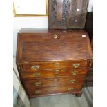 A mahogany bureau.