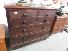 A 2 over 3 mahogany chest of drawers.