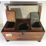 A Victorian mahogany tea caddy.