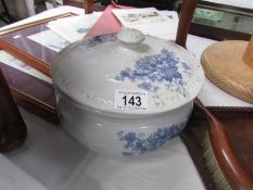 A rare chamber pot with matching lid.