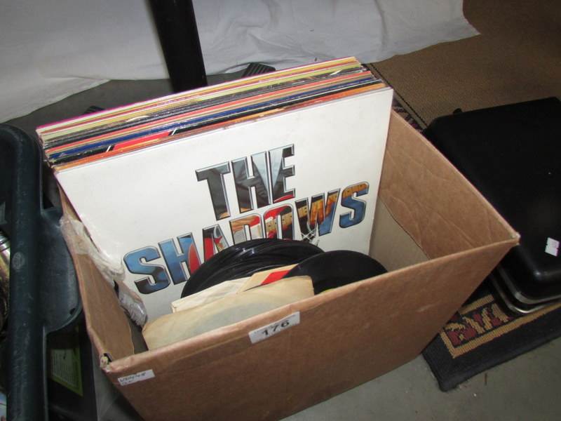 A box of LP and 48 rpm records, mostly 1980's.