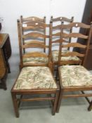 A set of 4 oak ladderback chairs.