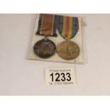 A WW1 war and victory medals for Pte M Booth, Yorks/Lancs.