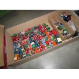 A large quantity of unboxed die cast tractors.