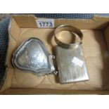 A silver cigarette case, silver purse and silver bangle, approximately 173 grams.