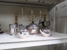 8 pieces of metalware including candelabra, teapot, milk jug, sugar bowl,