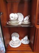 A Victoria tea set and one other,