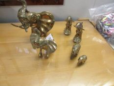 4 brass elephants and 2 dolphins.