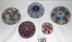 5 glass paperweights including millifiori.