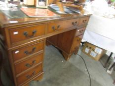 A mahogany double pedestal desk.