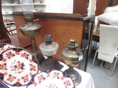 2 Victorian oil lamps and one other.