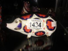 A Royal Crown Derby pig paperweight.