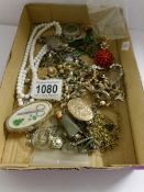 A mixed lot of costume jewellery including silver bracelet etc,.