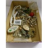 A mixed lot of costume jewellery including silver bracelet etc,.