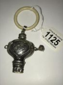 A silver babies rattle, Birmingham 1927.