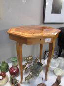 An inlaid musical jewellery table.