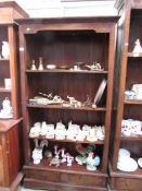 A mahogany bookcase.