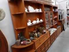 A 4 piece teak wall unit.