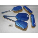 A Victorian silver and enamel dressing table set.