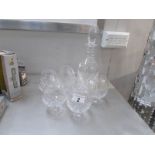 A fine quality crystal decanter and 6 brandy goblets.