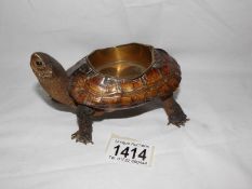Taxidermy - a small tortoise as a pin tray.