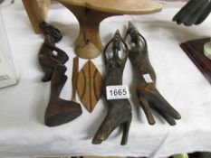 3 wooden tribal figure and a tribal headrest,