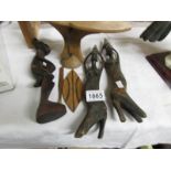 3 wooden tribal figure and a tribal headrest,