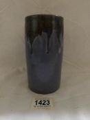 An Upchurch pottery cylindrical vase with blue slip glaze, signed J.