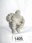 An original Michelin man, possibly a car mascot.