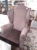 A wing arm chair.