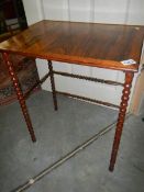 A bobbin leg occasional table.