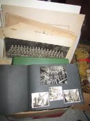 A box of albums of photographs. Subjects include military, farming, landscape, architecture etc.