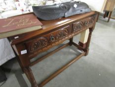 An oak 2 drawer side table.