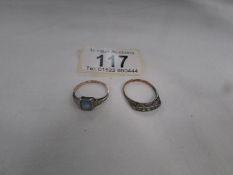 A 9ct gold ring and a silver ring,.