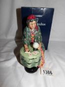 A Royal Doulton Fortune Teller figure.