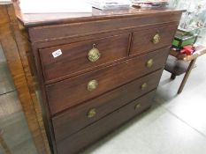 A 2 over 3 mahogany chest of drawers.