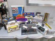 A quantity of boxed die cast including Lledo, Corgi etc and 2 boxed gas pumps.