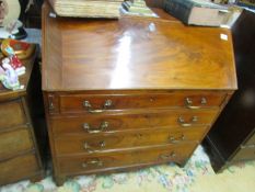 A mahogany bureau.