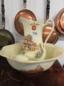 An 'Old English Inns' jug and basin set.