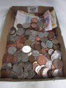 A quantity of assorted foreign coins and bank notes.