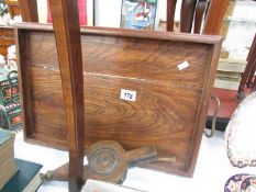 An oak tray and a pair of old working bellows.