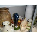 A quantity of pottery vases,