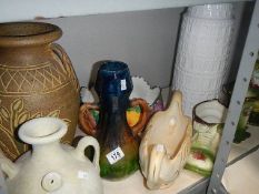 A quantity of pottery vases,